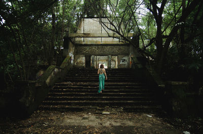 Full length of woman on staircase