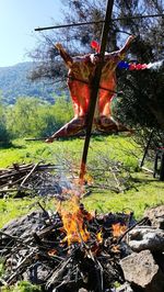 View of bonfire on field