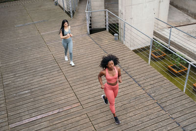 High angle view of women jogging outdoors