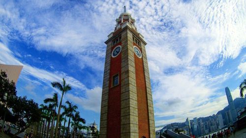 Low angle view of clock tower against sky
