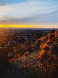 Aerial view of city during sunset