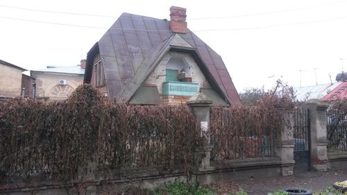 View of abandoned building against sky