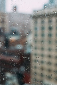 Full frame shot of wet glass window