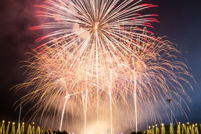 Low angle view of sky illumed with fire crackers