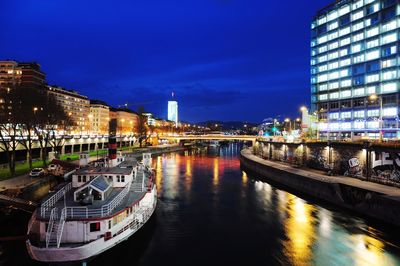 Awesome. fantastic view by donube river at night, in vienna austria.