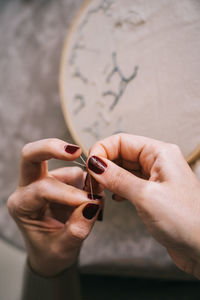 Close-up of person holding hands