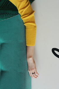 High angle view of woman on sofa