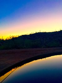 Scenic view of landscape at sunset