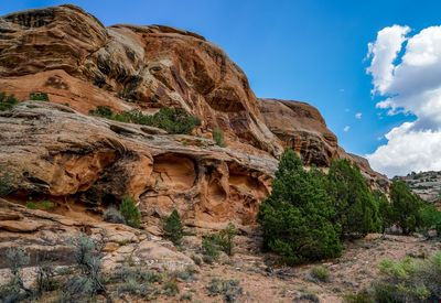 Rock formations on mountain against sky