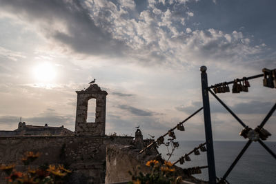 Church against sky during sunset