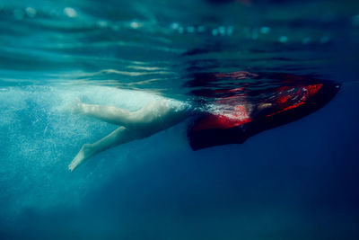 Man swimming in sea