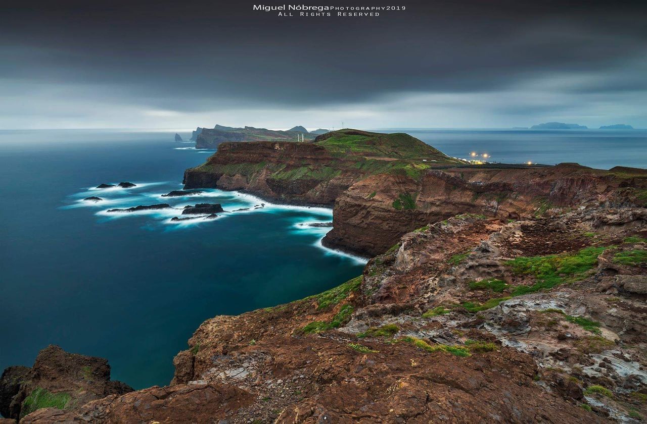 sea, water, scenics - nature, beauty in nature, rock, cloud - sky, sky, nature, land, tranquil scene, solid, tranquility, rock - object, beach, day, rock formation, no people, idyllic, non-urban scene, horizon over water, outdoors, rocky coastline