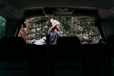 Woman sitting in car