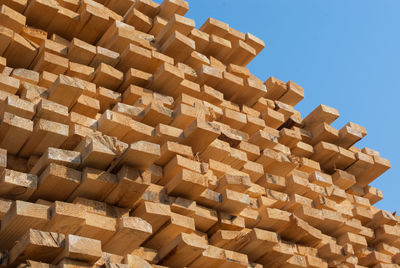 Low angle view of stack of wood