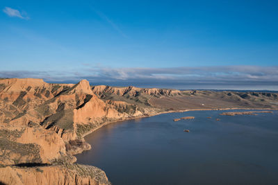 Scenic view of land against sky