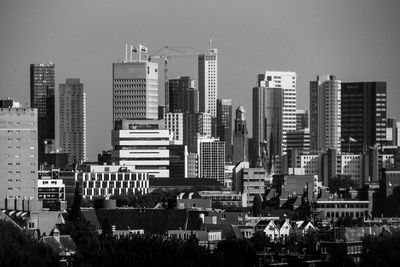 High angle view of buildings in city against sky