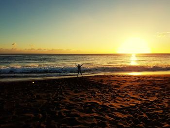 Scenic view of beach during sunset