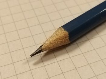 High angle view of pencil on paper