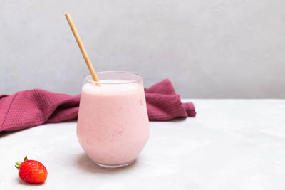 Close-up of drink with ice cream in glass on table