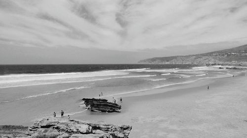 Scenic view of sea and beach against sky