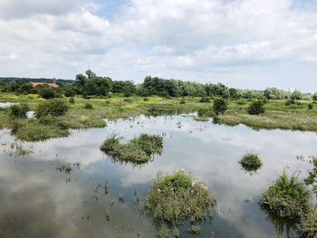 Scenic view of lake against sky