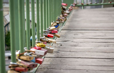 Close-up of padlocks on footbridge