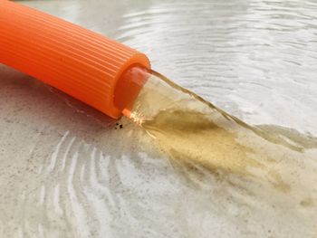 High angle view of bottle on table