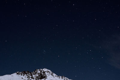 Low angle view of stars in sky at night