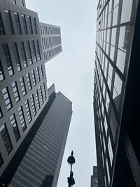 Low angle view of modern buildings against sky