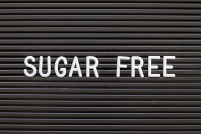 Close-up of text on shutter