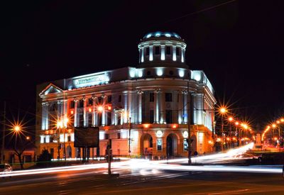 Light trails on city street at night