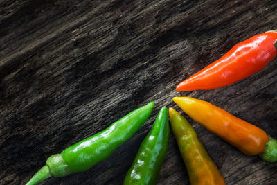 High angle view of chili peppers on table