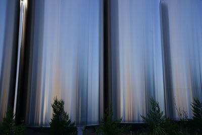 Low angle view of blue sky seen through window