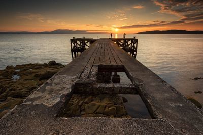 Scenic view of sea at sunset