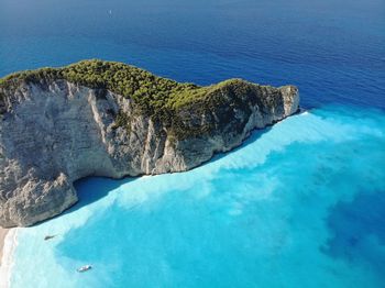 High angle view of rocks in sea