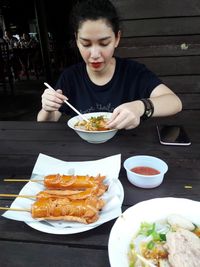 Close-up of man eating food