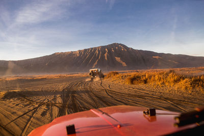 Scenic view of land against sky