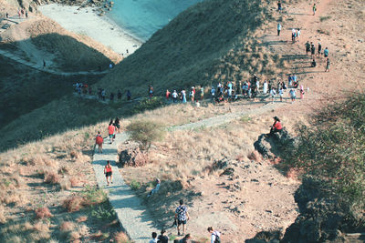 High angle view of people on mountain road