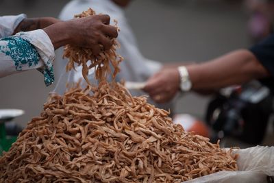 Close-up of hand holding bread