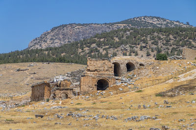 Ancient ruins in the mountains against clear sky