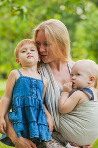 Portrait of mother and daughter at home