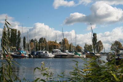 Panoramic view of boats moored at harbor