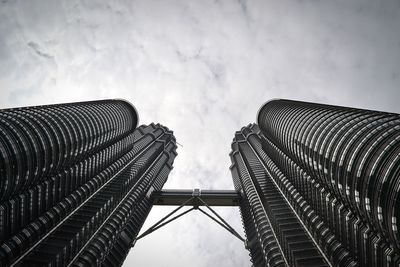 Low angle view of modern buildings against sky