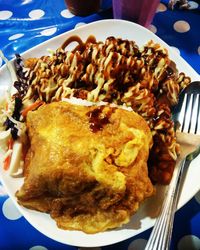 Close-up of served food in plate