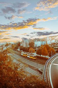 Train in city against sky