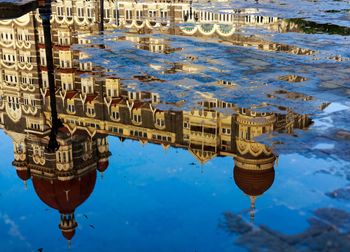 Water reflection of architecture of iconic taj hotel, south mumbai, india