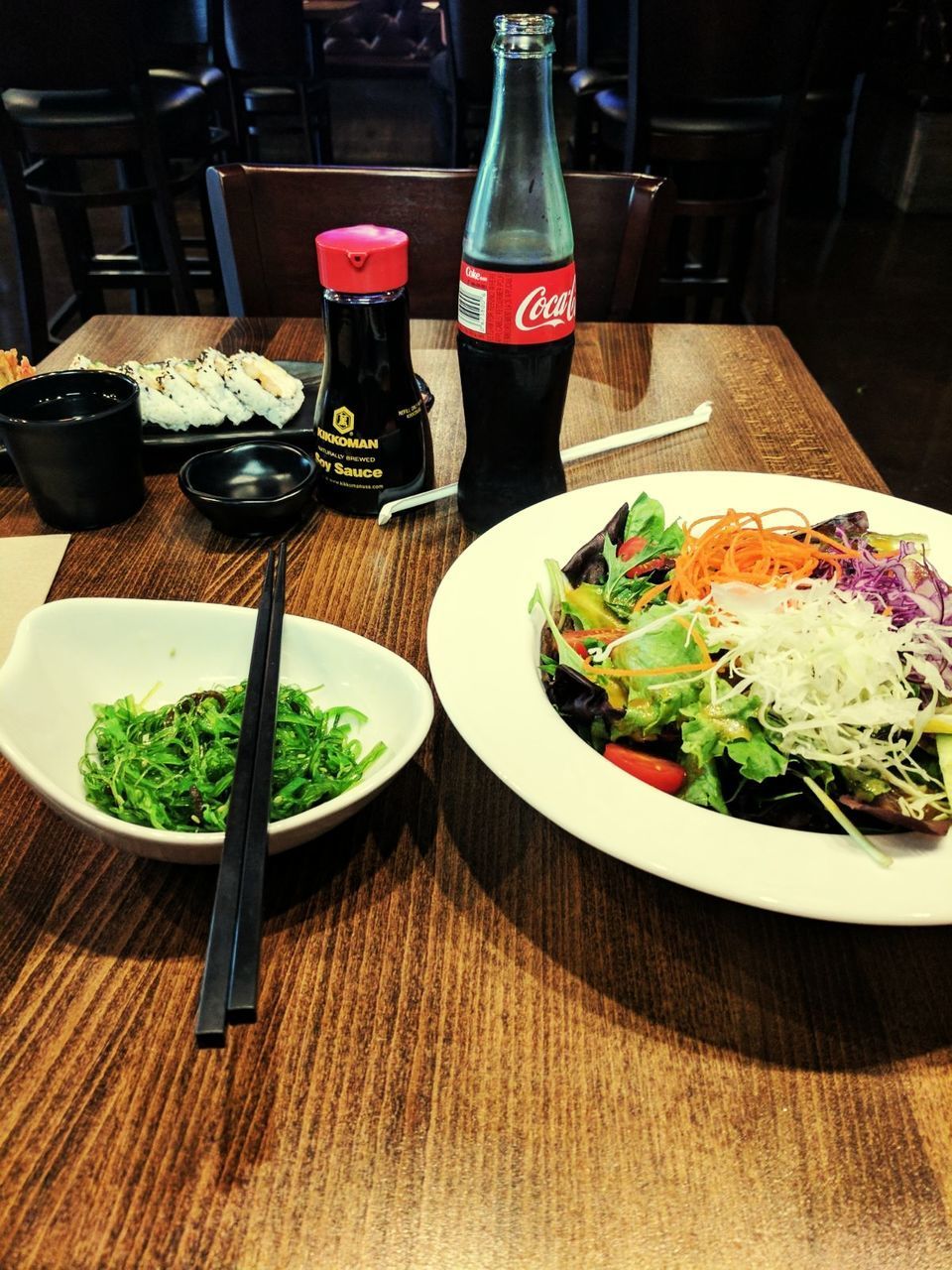 CLOSE-UP OF SALAD SERVED ON TABLE