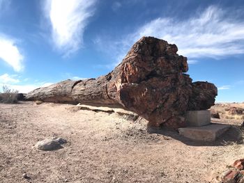 Rock formation on land against sky