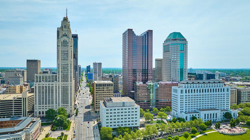 Skyscrapers in city against sky