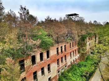 Abandoned building against sky